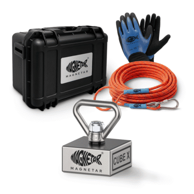 Product bundle photo of a Magnetar Cube X fishing magnet kit including a black protective case, orange rope, and blue gloves.